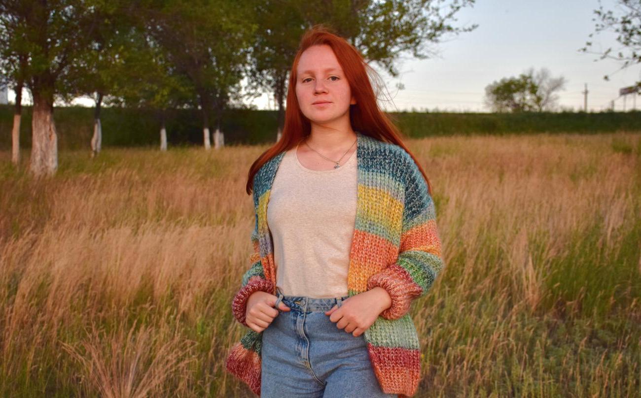 Russian Language Resident standing in a field