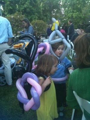 Two girls with ballon toys